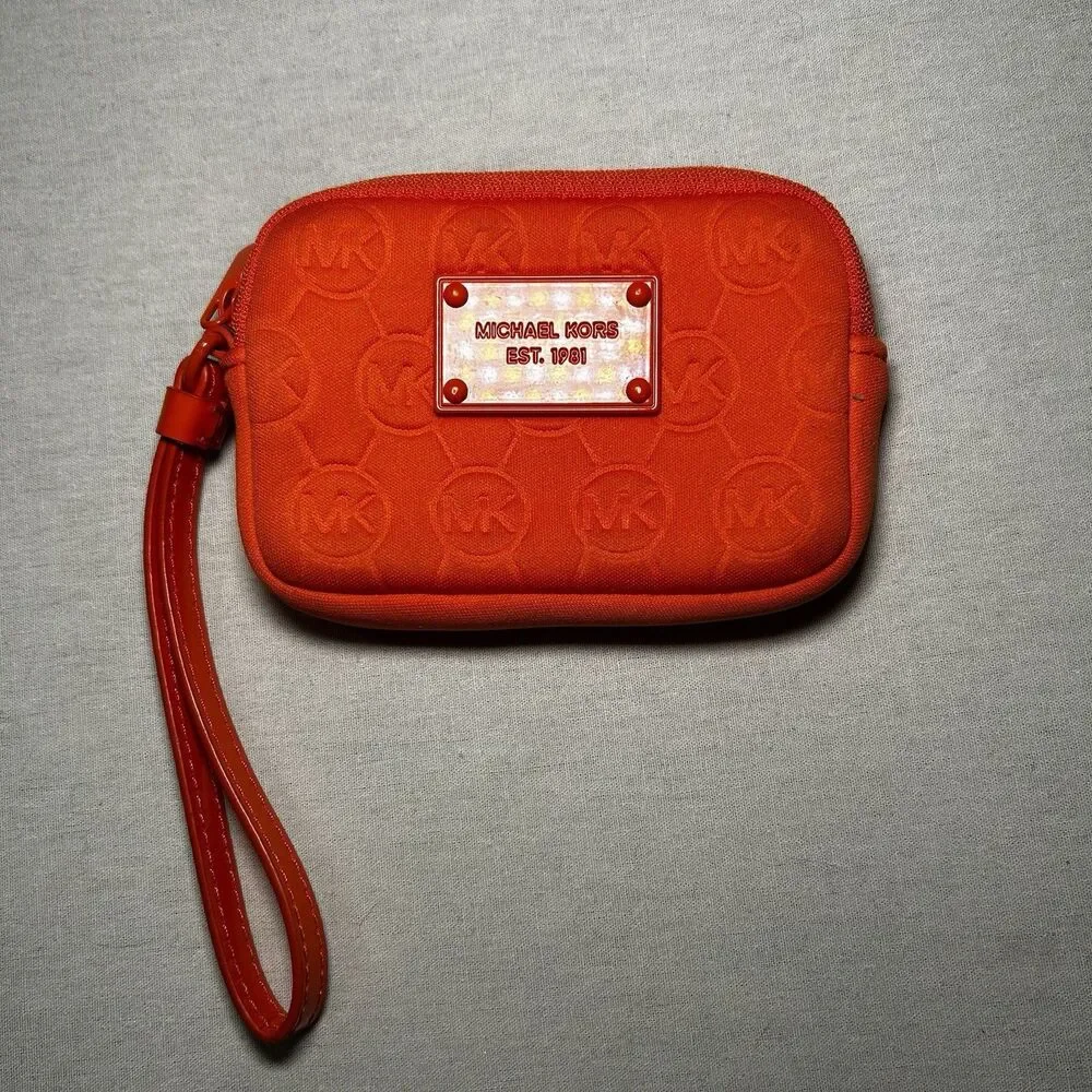 bright orange Michael Kors neoprene wristlet with a matching strap